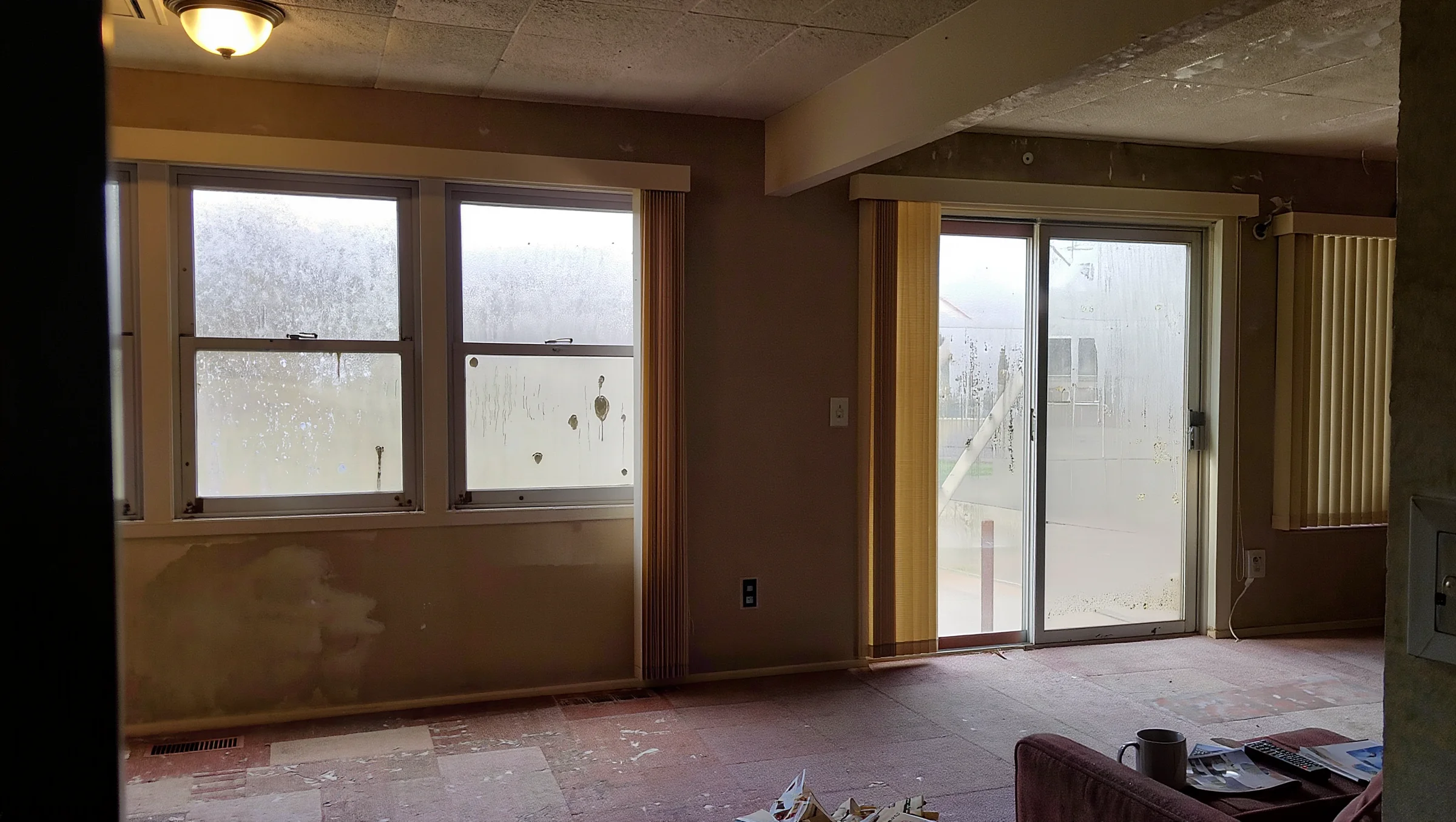 Before: New windows and patio door